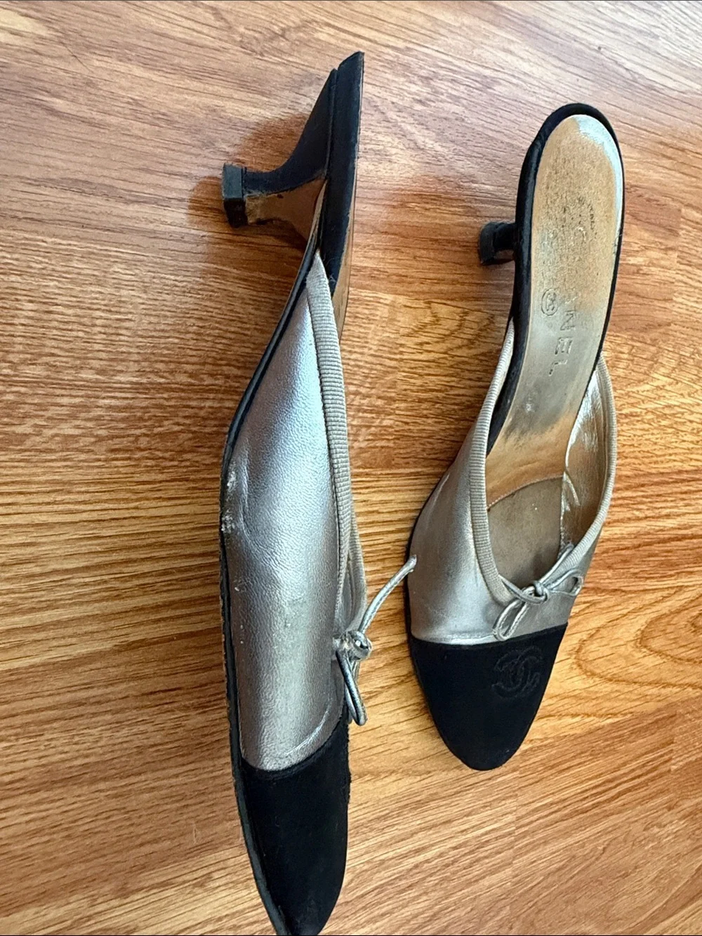 CHANEL Two-Tone Black and Silver Slip-On Mules